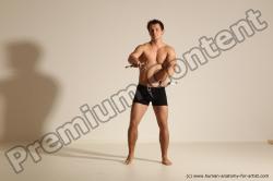 Underwear Fighting with axe Man White Muscular Short Brown Dynamic poses Academic